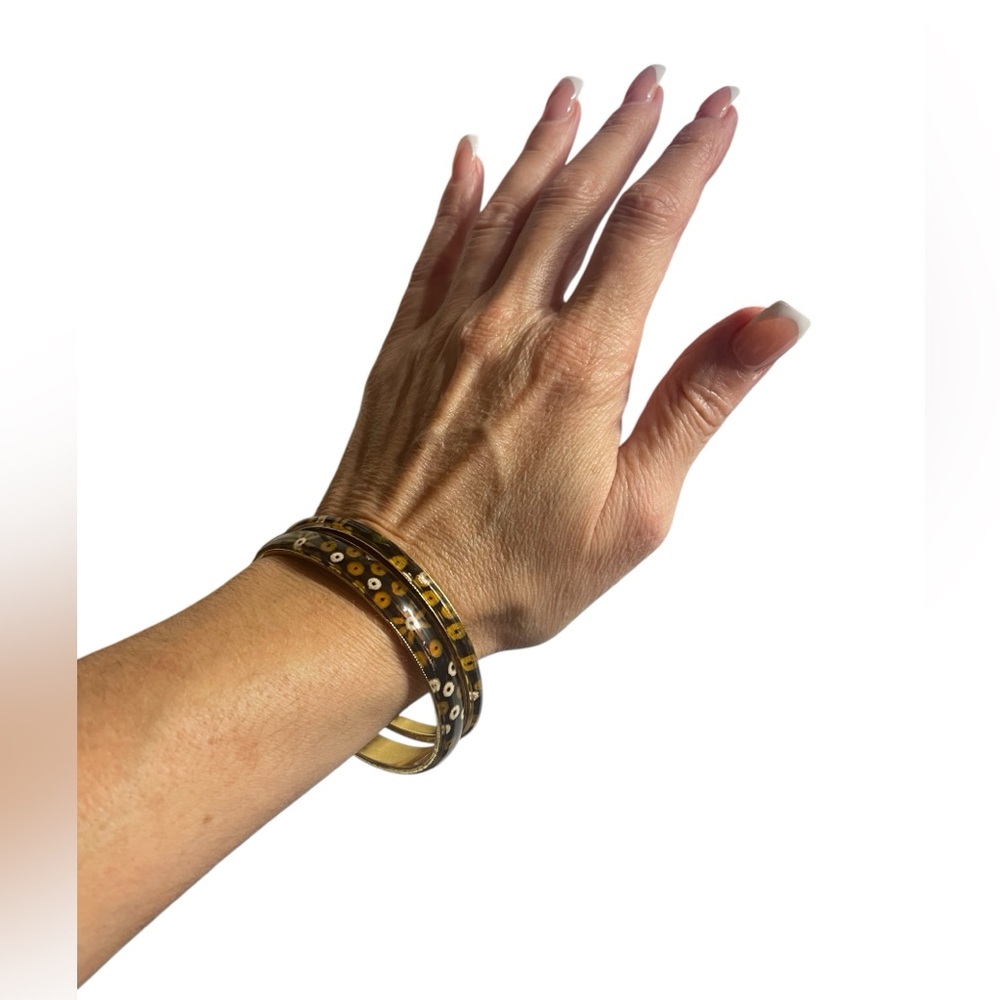 Enameled Gold Tone Bangles with Floral & Geometric Design